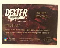 Reverse of trading card with Dexter logo, text, card number D4:JM:2