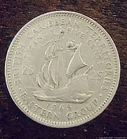 Reverse of 1965 British Caribbean Territories 25-cent coin showing Golden Hind and denomination
