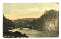 Front view of tinted postcard showing Hoddom Bridge scene