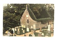 Front of colour postcard showing Auld Kirk, Alloway with graveyard scene