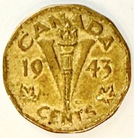 Reverse of 1943 Canada Tombac Victory nickel displaying torch, V, date and CENTS legend