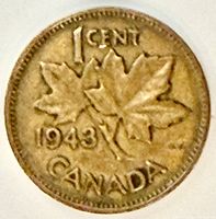 Reverse of 1943 Canada 1 cent coin showing maple leaves, denomination, date