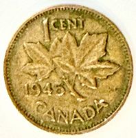 Reverse side showing maple leaves, date 1945 and denomination
