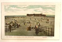 Front of postcard depicting beach, lighthouse and fort