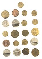 Over 20 assorted metal tokens and coins arranged in grid