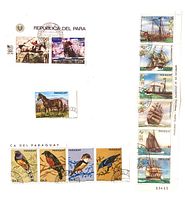 front view showing all 14 Paraguay stamps on album page