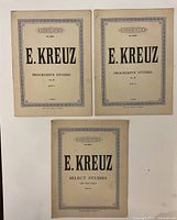 Front covers of three E. Kreuz study books