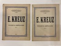 Front covers of Book I and Book II showing titles and condition