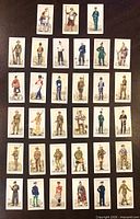 All 33 tobacco cards laid out in rows