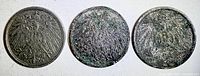 Obverse of all three coins showing crowned Imperial eagle