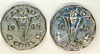 Both coin reverses showing torch, large V, maple leaves, date 1945