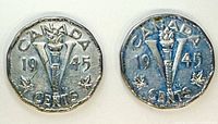 Reverse of both 1945 Victory nickels showing V torch design