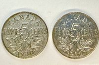 Reverse sides of both coins showing CANADA, FIVE CENTS, maple leaves, dates 1930 and 1932