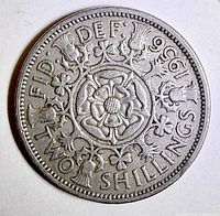 Reverse of 1956 two shillings coin showing Tudor Rose and legends