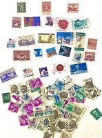 Entire assortment of U.S. stamps spread out
