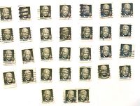 Grid layout of approximately 34 Eisenhower 8¢ stamps with cancellations visible