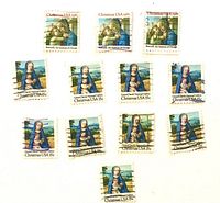Group shot of all 13 stamps arranged on white background