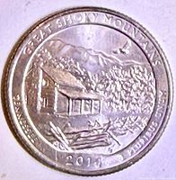Reverse of 2014 Great Smoky Mountains quarter showing log cabin design