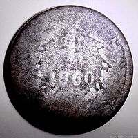 Reverse of coin showing faint 1 and 1860 date