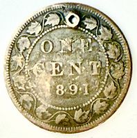 Reverse view showing ONE CENT 1891 within maple leaf wreath and hole at rim