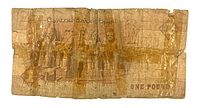 Back side depicting entrance to Abu Simbel, heavy tape and creasing, English ONE POUND text