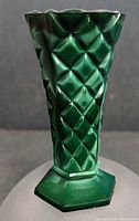 Front view of jade green malachite glass vase showing diamond quilt pattern and scalloped rim