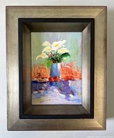 Front view of framed painting showing art and frame