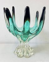 Front view of aqua and clear freeform art glass bowl