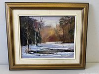 Full front view of framed painting