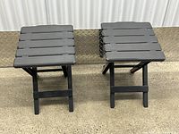 Both foldable plastic side tables front view