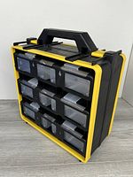 Angled left-front view highlighting depth and carry handle