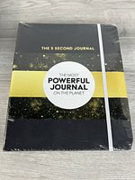 Front view of sealed The 5 Second Journal