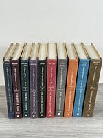 Front view of all ten book spines