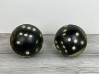 Both bowling balls front view showing dice pips