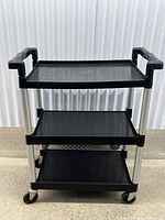 Front view of 3-tier plastic rolling cart