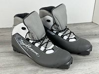 Pair of Salomon Siam S boots angled front view