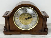 front view showing dial details and wooden case