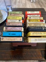 Front view of filled rack showing multiple 8-track titles