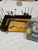 Overall view of station, vise, tools, materials