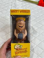 Front view of boxed Barney Rubble Wacky Wobbler