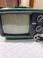 Front view showing screen, controls, bezel