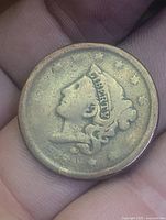 Obverse of Liberty Head large cent showing worn portrait and LIBERTY coronet