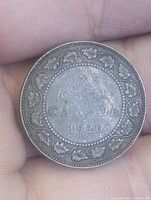 Reverse of 1920 Canadian large cent showing maple-leaf wreath and date