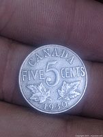 Reverse showing CANADA FIVE CENTS 1930 and maple leaves