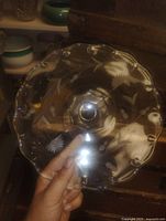 Top view showing cornflower etching and scalloped rim