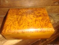 Top view showing burl wood grain and finish