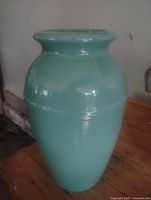 Front view of robin egg blue vase