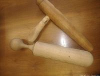 Both wooden tools laid flat showing overall form