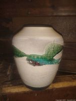 Full view of vase front showing glaze pattern and form