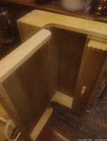 Toolbox open showing interior compartment and hinged door